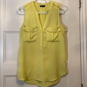 Yellow sleeveless blouse